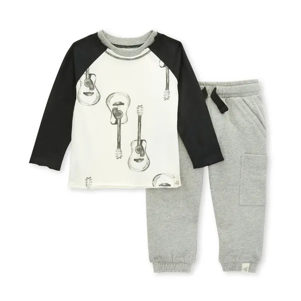 burt's bees babies guitar pant set gray pants and a white top with black sleeves with gray guitars on the shirt