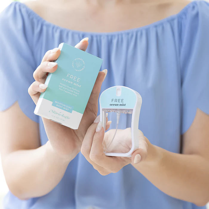Person holding two skincare products with a blue top