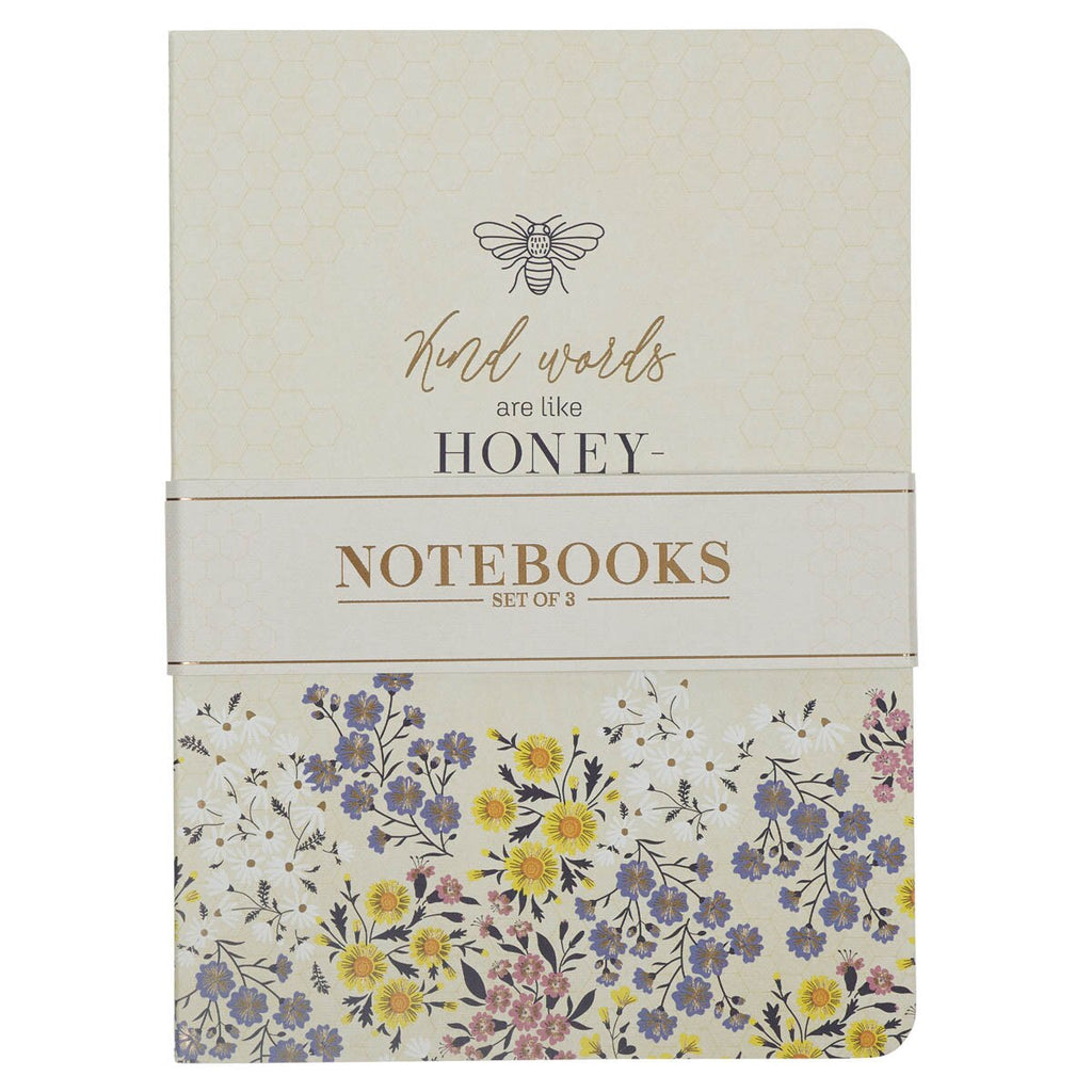 Notebook set with floral design and text on a white background
