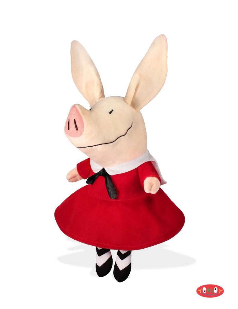 Plush toy pig in a red dress on a white background