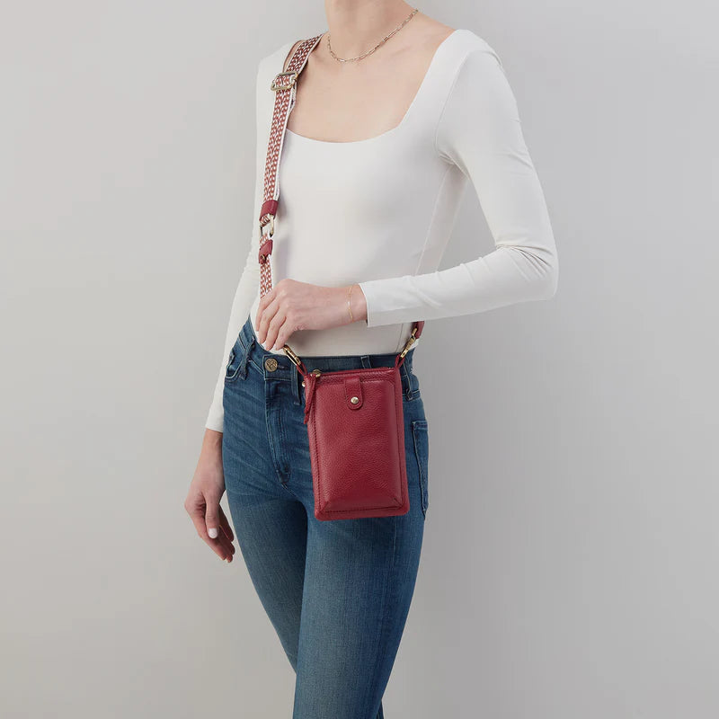 cass phone crossbody hobo on a white background