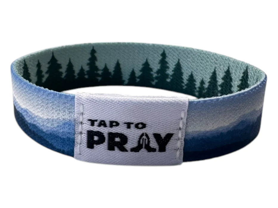 Wristband with nature design and 'Tap to Pray' text on a white background