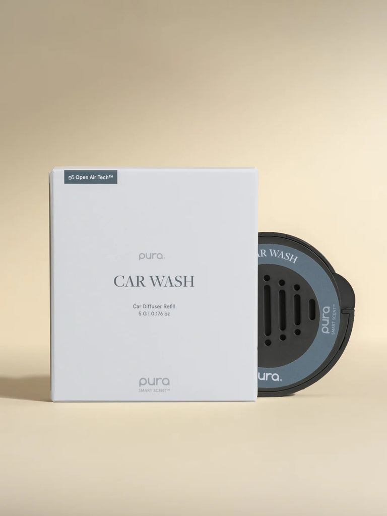 Pura car wash diffuser packaging on a beige background