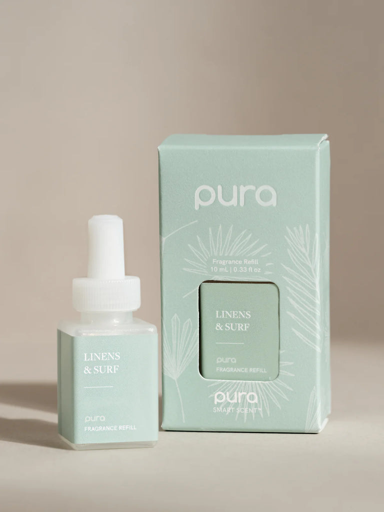 pura diffuser oil on a cream background