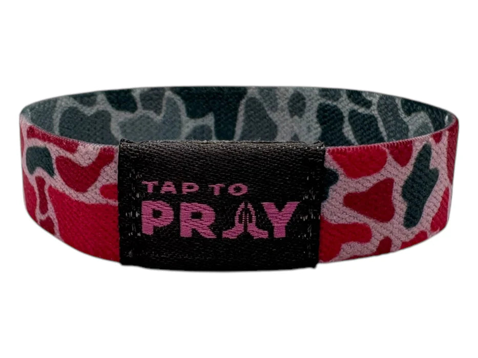 Wristband with 'Tap to Pray' text on a camouflage pattern