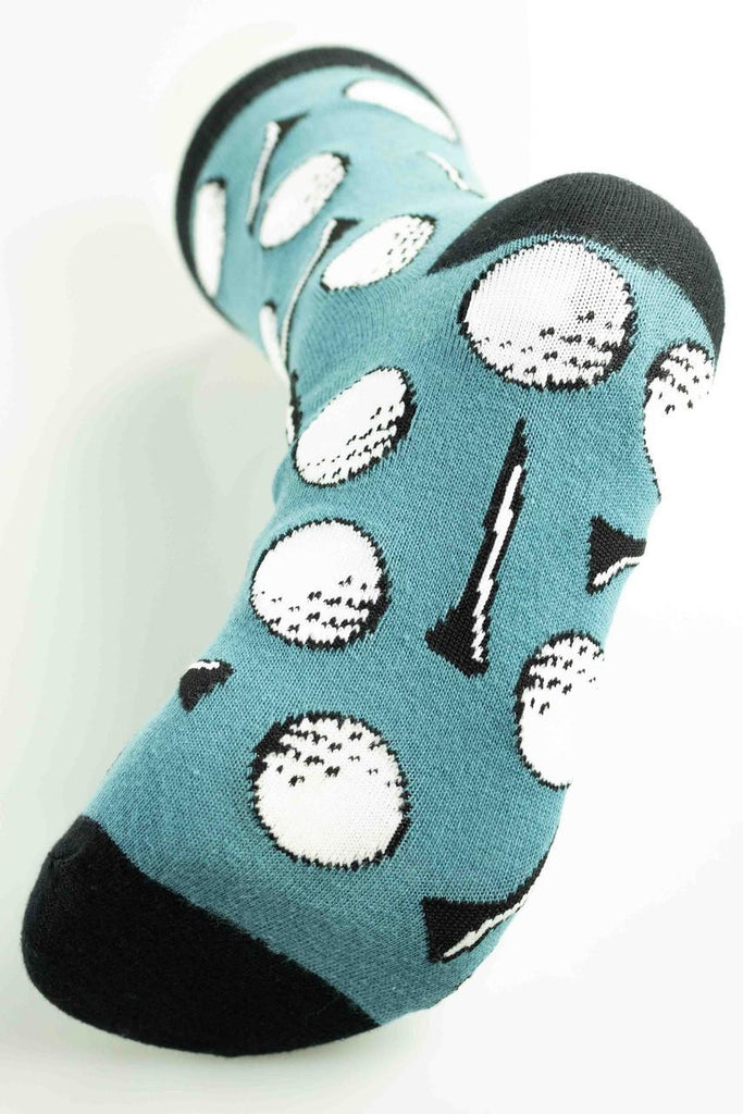 Teal sock with golf ball and club pattern on a white background
