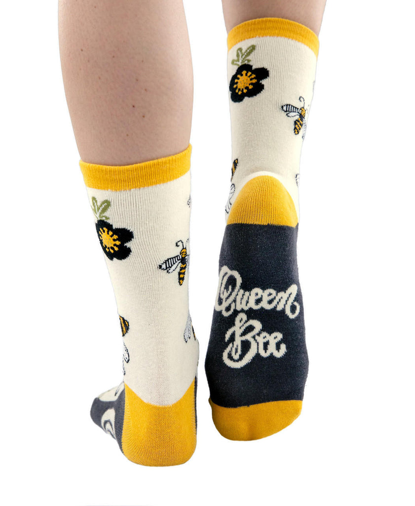 queen bee socks on a white background