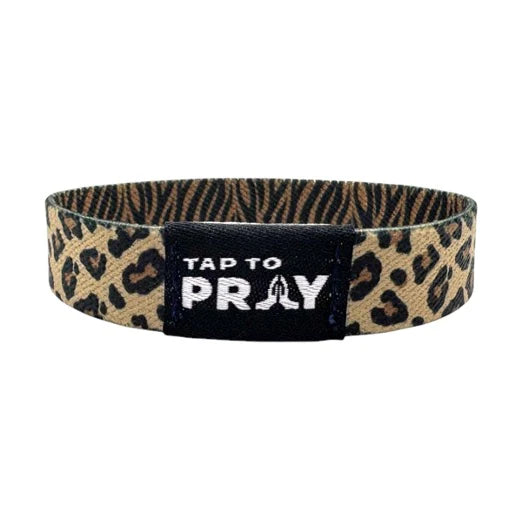 Leopard print wristband with 'Tap to Pray' text on a white background