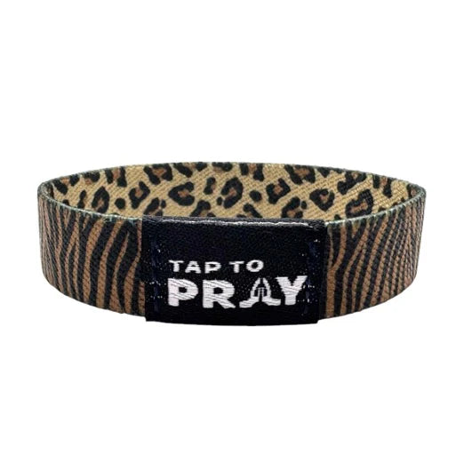 Leopard print wristband with 'Tap to Pray' text on a white background