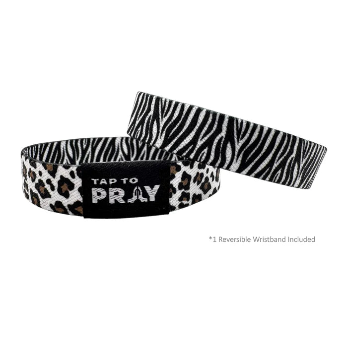 Two zebra print wristbands with leopard print accents on a white background.