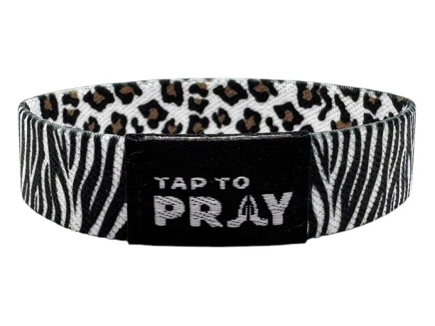 Bracelet with animal print pattern and 'Tap to Pray' text on a white background