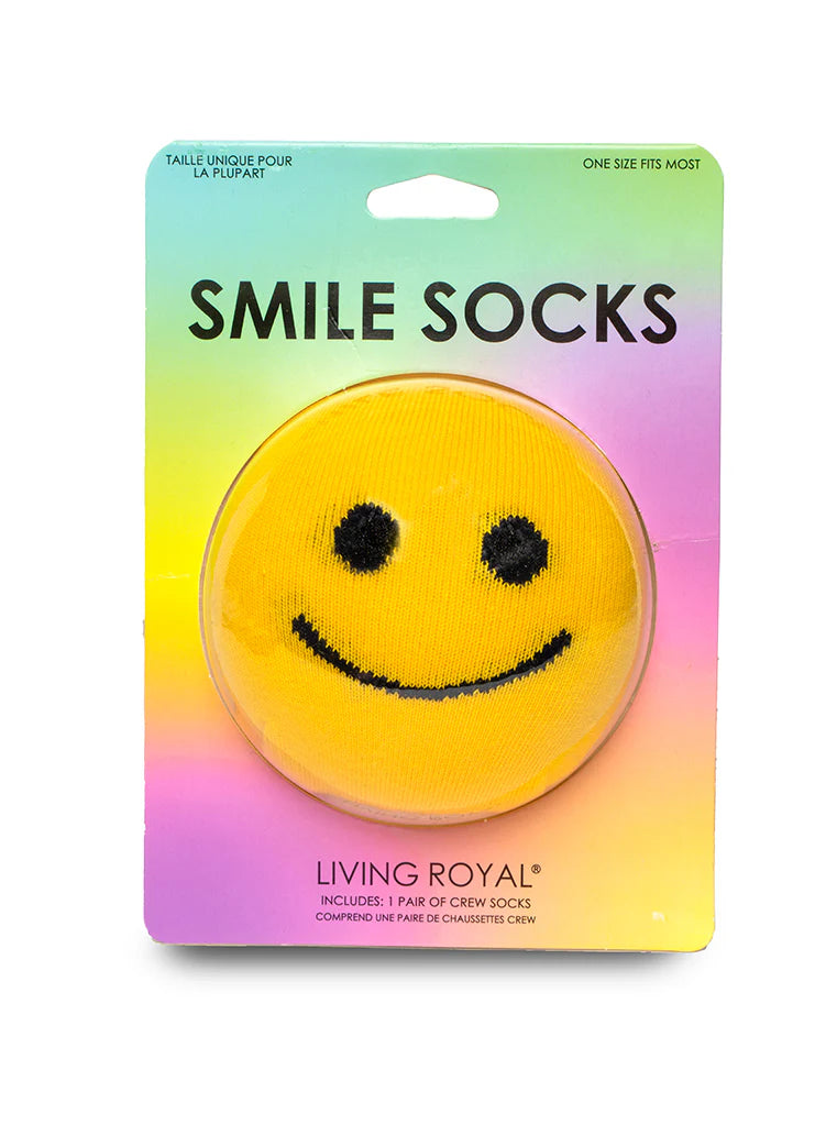 Packaging of smile socks with a smiley face design on a gradient background