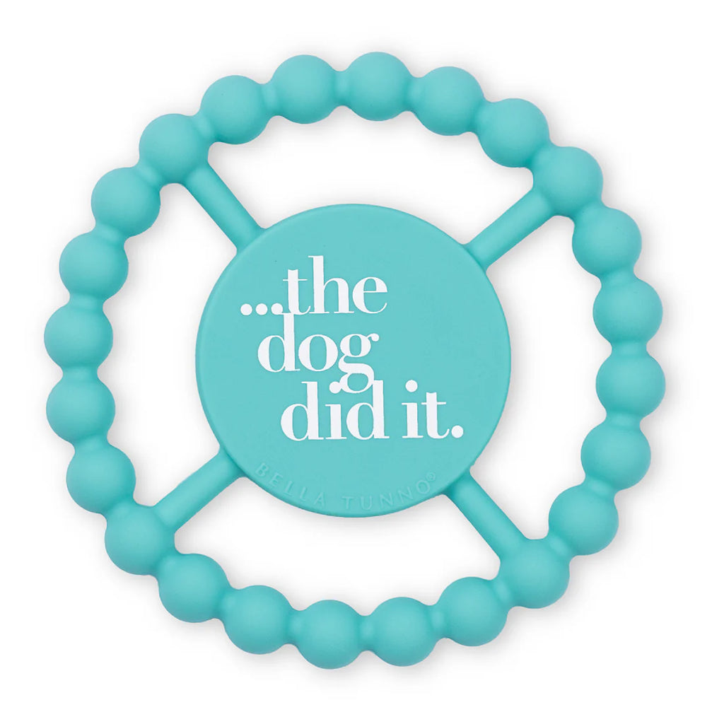 Turquoise dog toy with 'the dog did it.' text on a white background