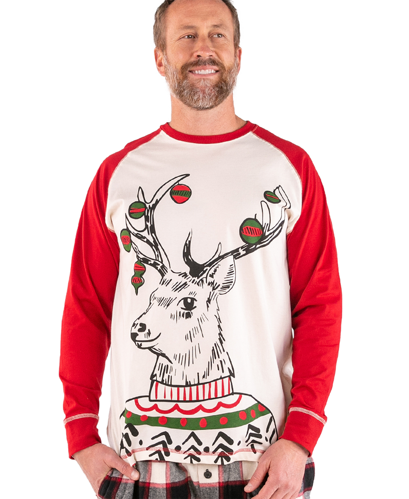 Man wearing a red and white long-sleeve shirt with a reindeer design on a white background