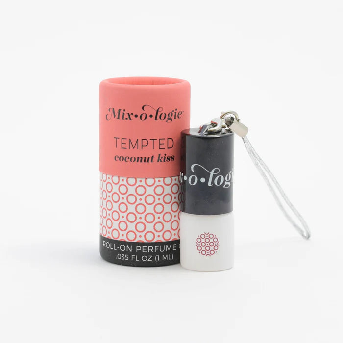 Roll-on perfume with pink cap and black body on a white background