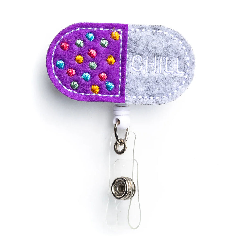 chill pill badge reel holder on a white background