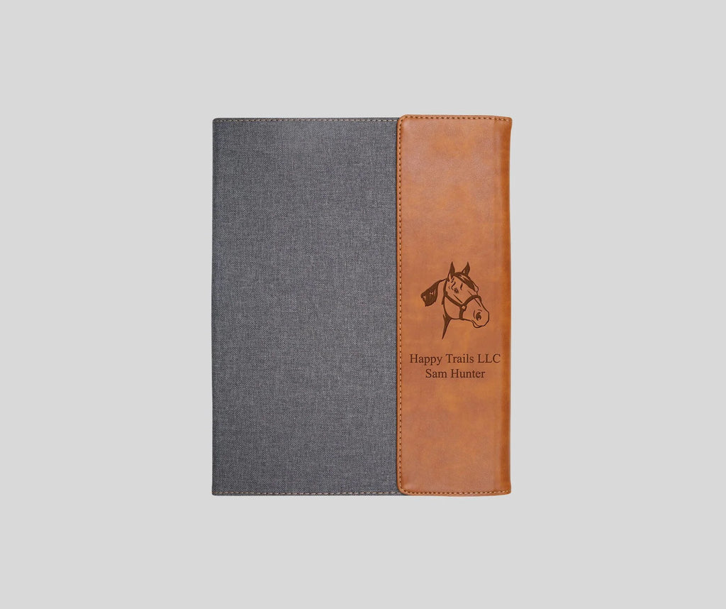 personalized gray and tan faux leather padfolio on a white background