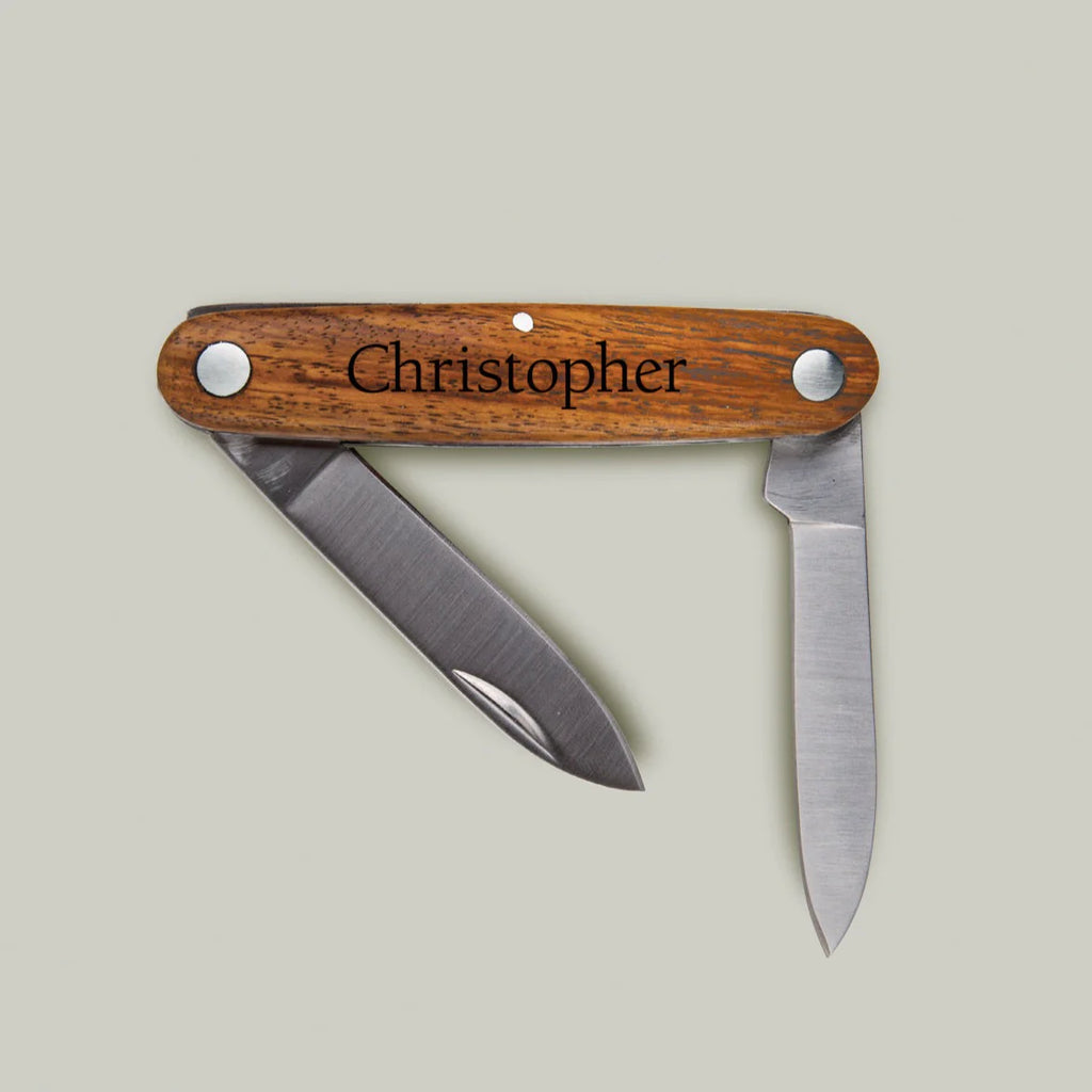 personalized wood pocket knife on a white background