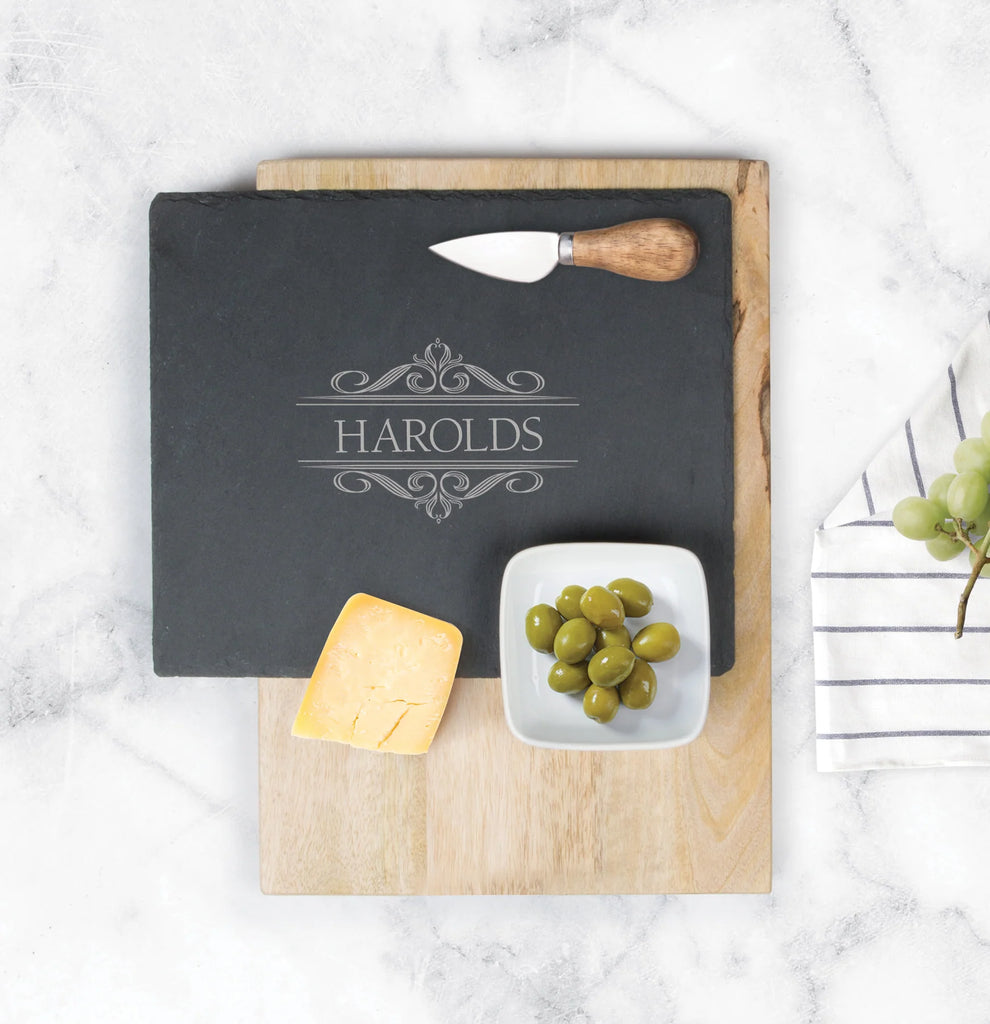 personalized slate cheese board on a marble counter top