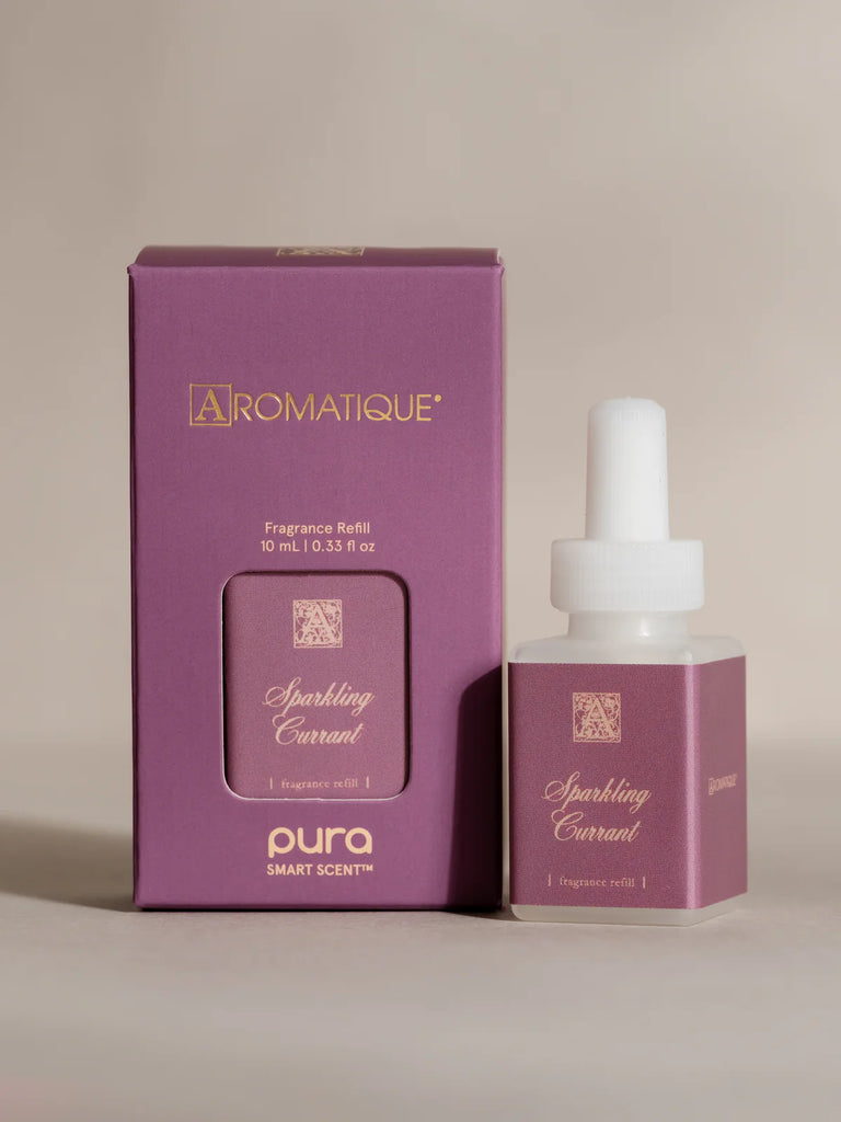 pura aromatique diffuser oil on a cream background