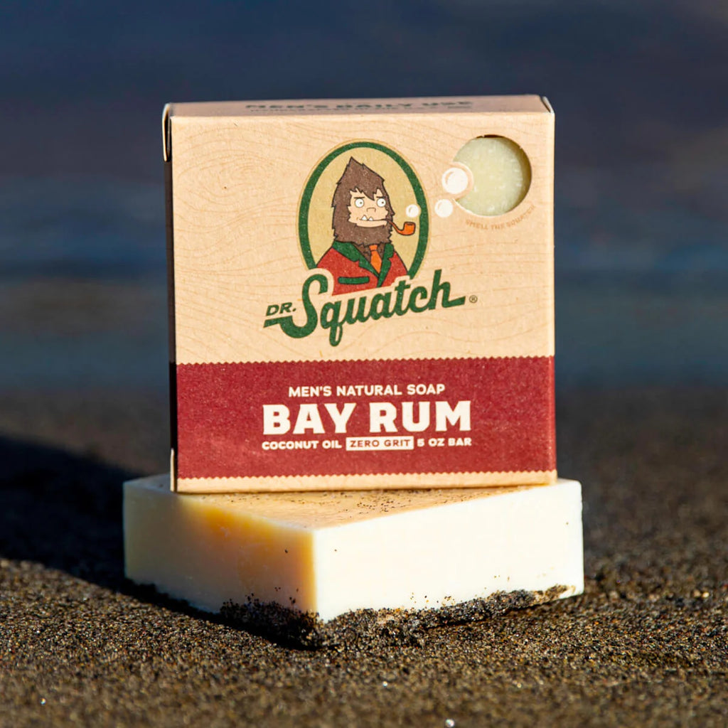 dr. squatch bay rum soap in sand