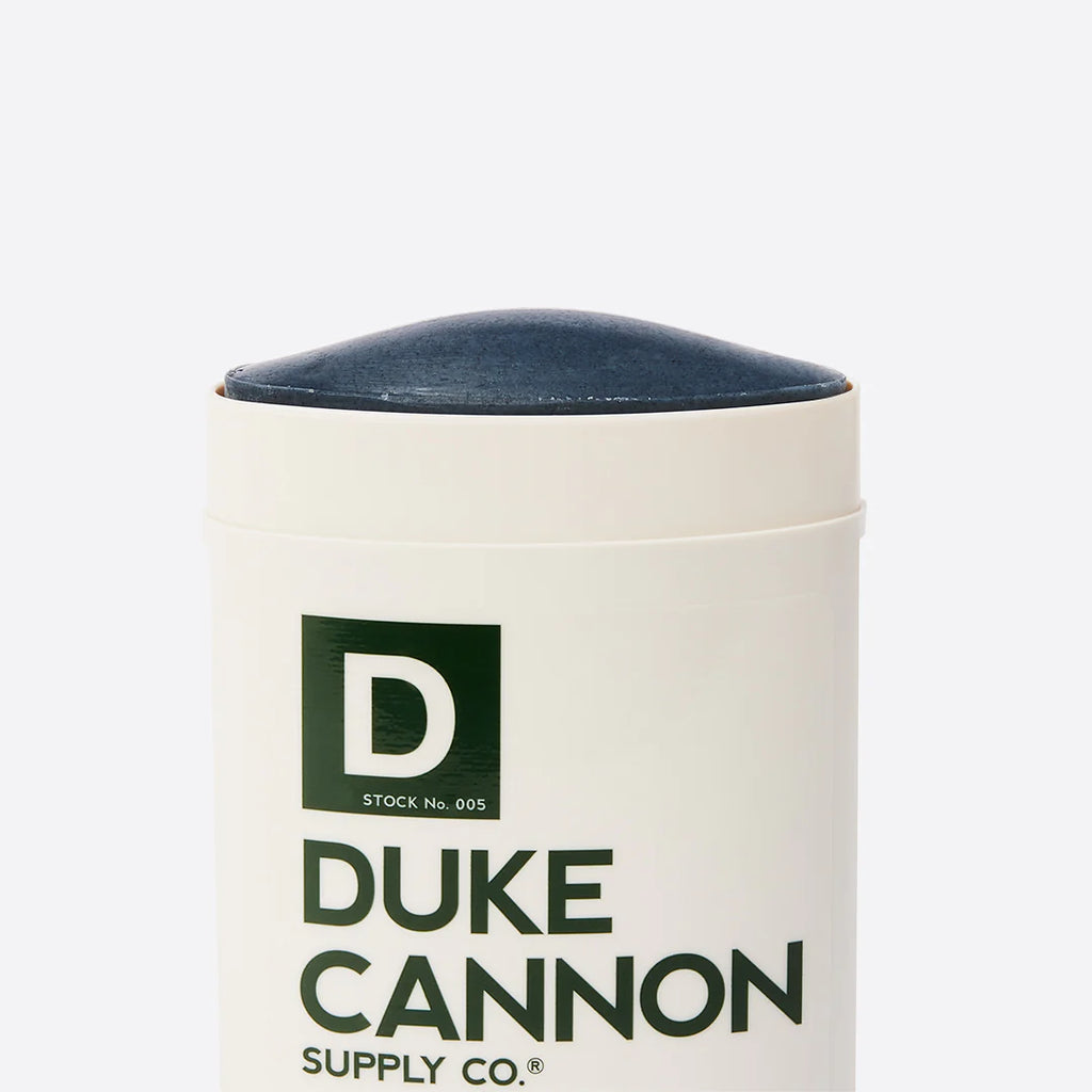 duke cannon bay rum deodorant on a white background