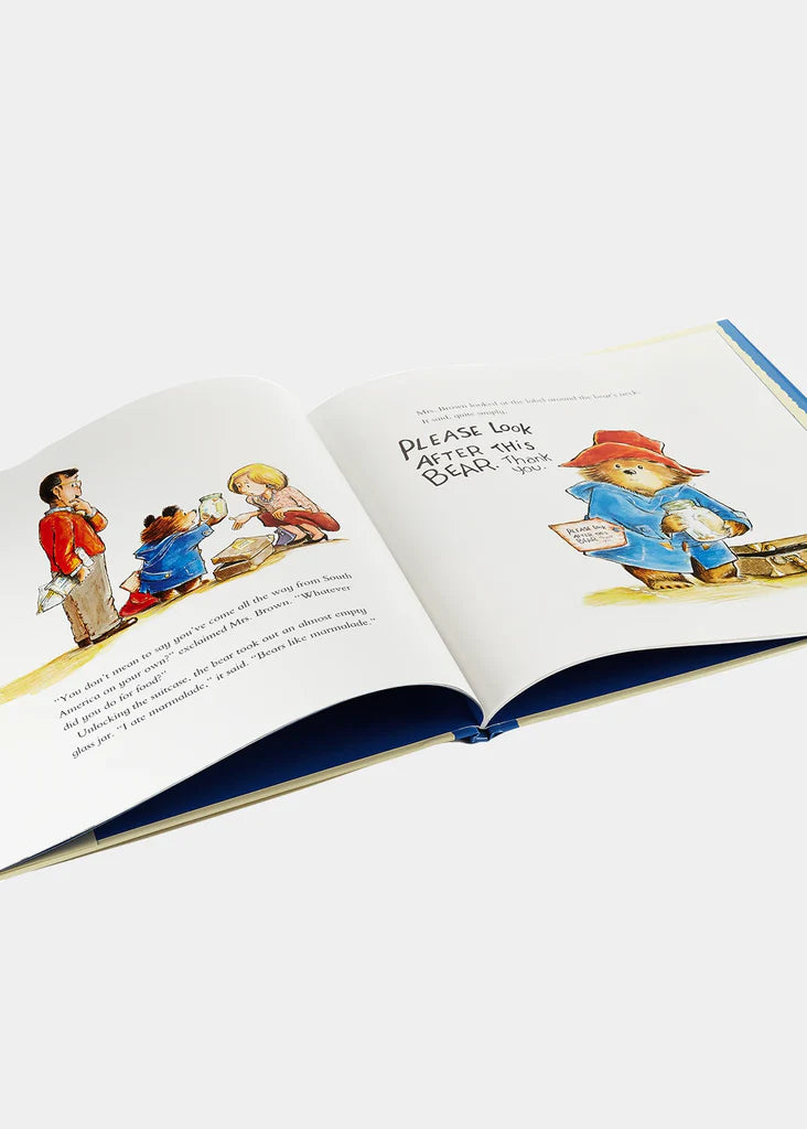 Open book with illustrations of characters on a white background