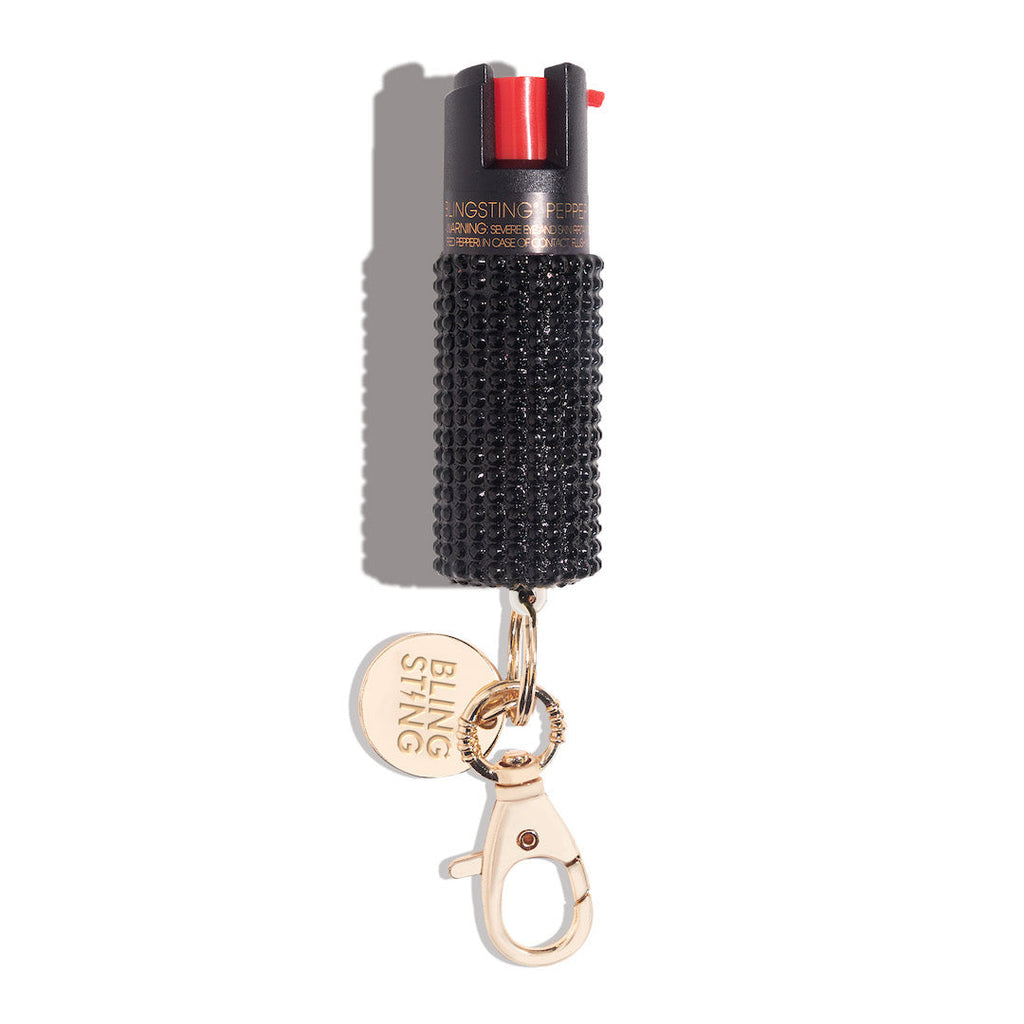 rhinestone bling sting pepper spray on a white background