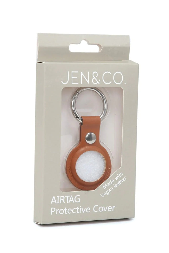 brown Jen and co apple air tag in case on a white background