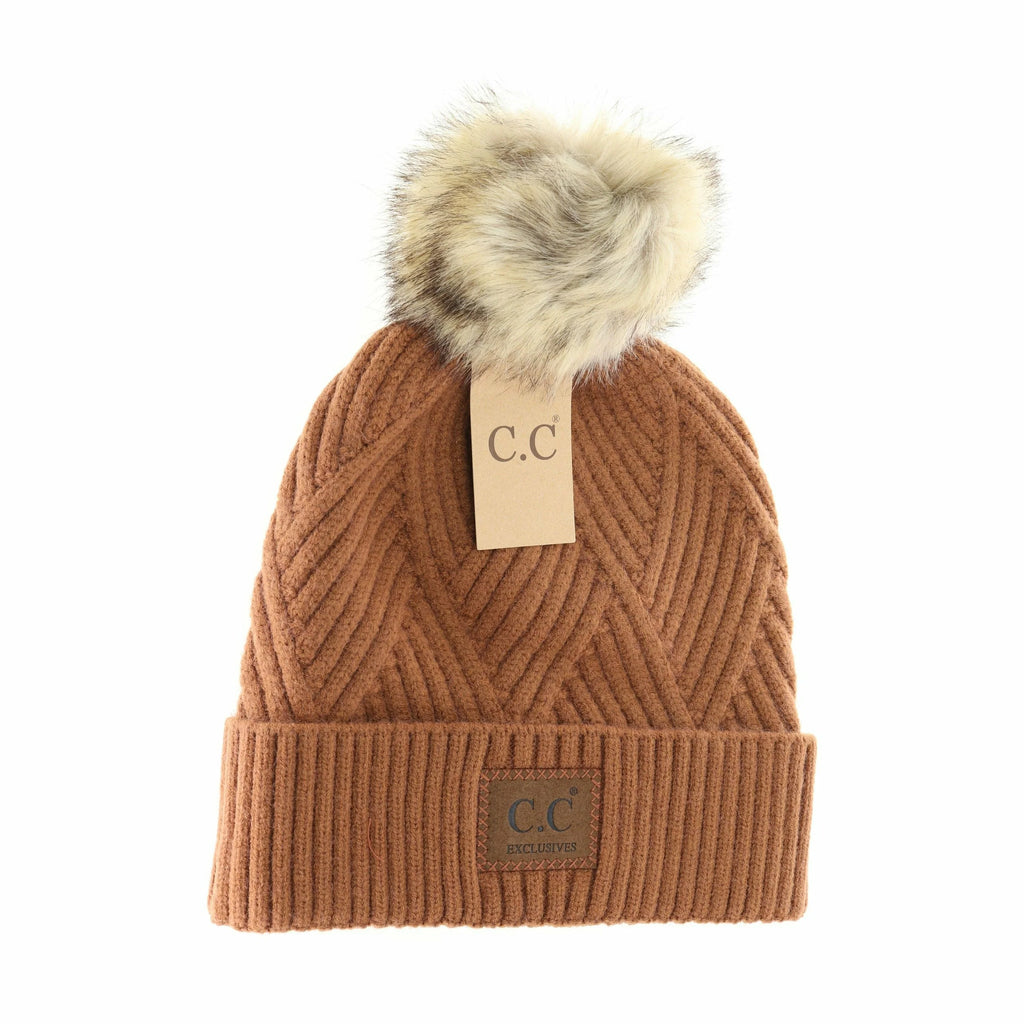 large patch heathered pom cc beanie on a white background