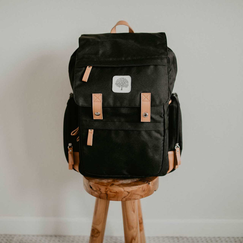 black diaper bag on a white background