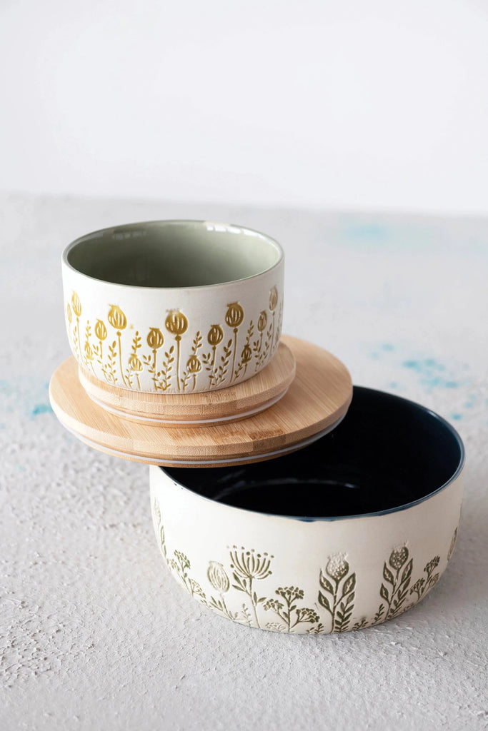 stoneware canister with bamboo lid on a white background