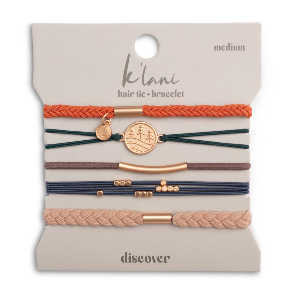 Set of hair ties and bracelets on a 'klani' branded card with visible branding.