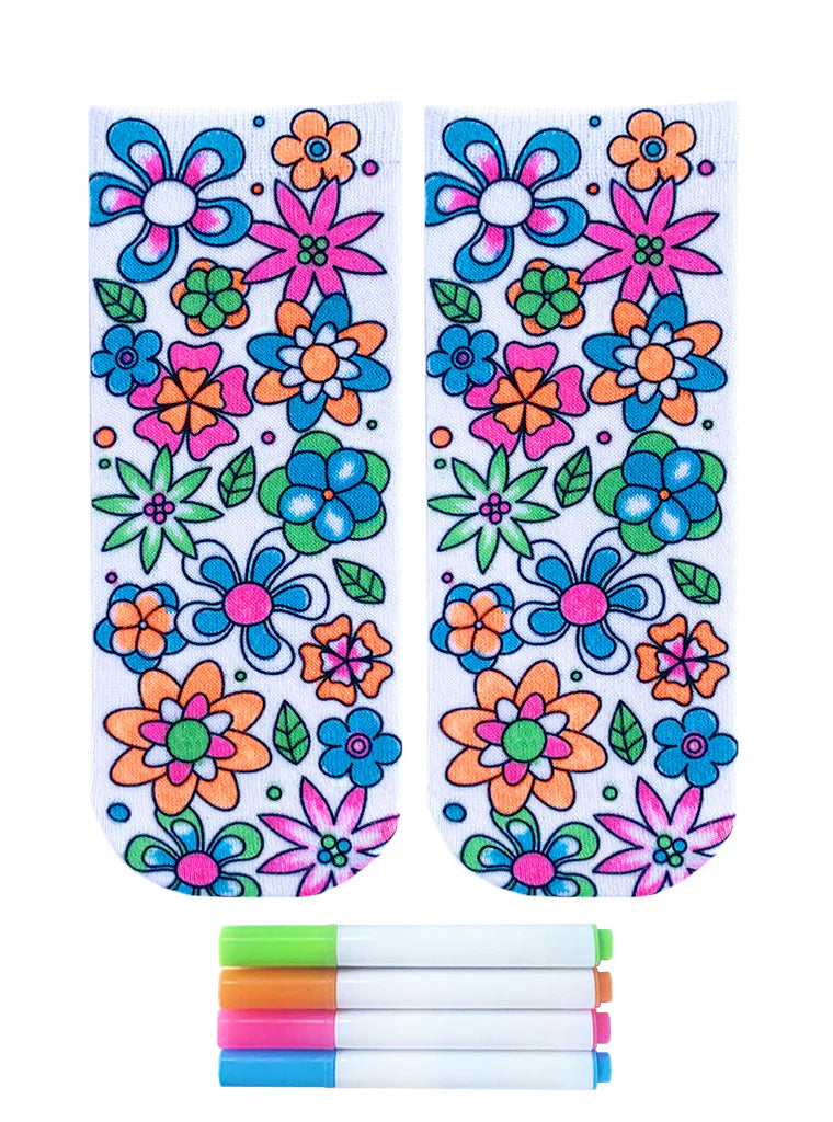 Colorful floral designs on a white background with markers below.