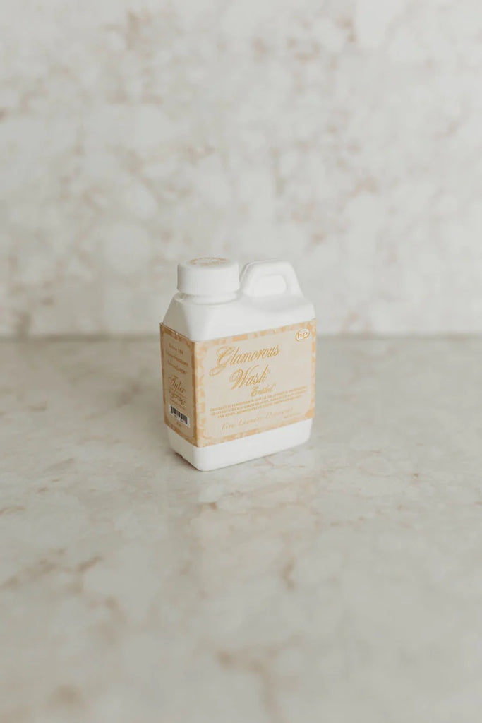 Tyler candle company laundry detergent on a marble background