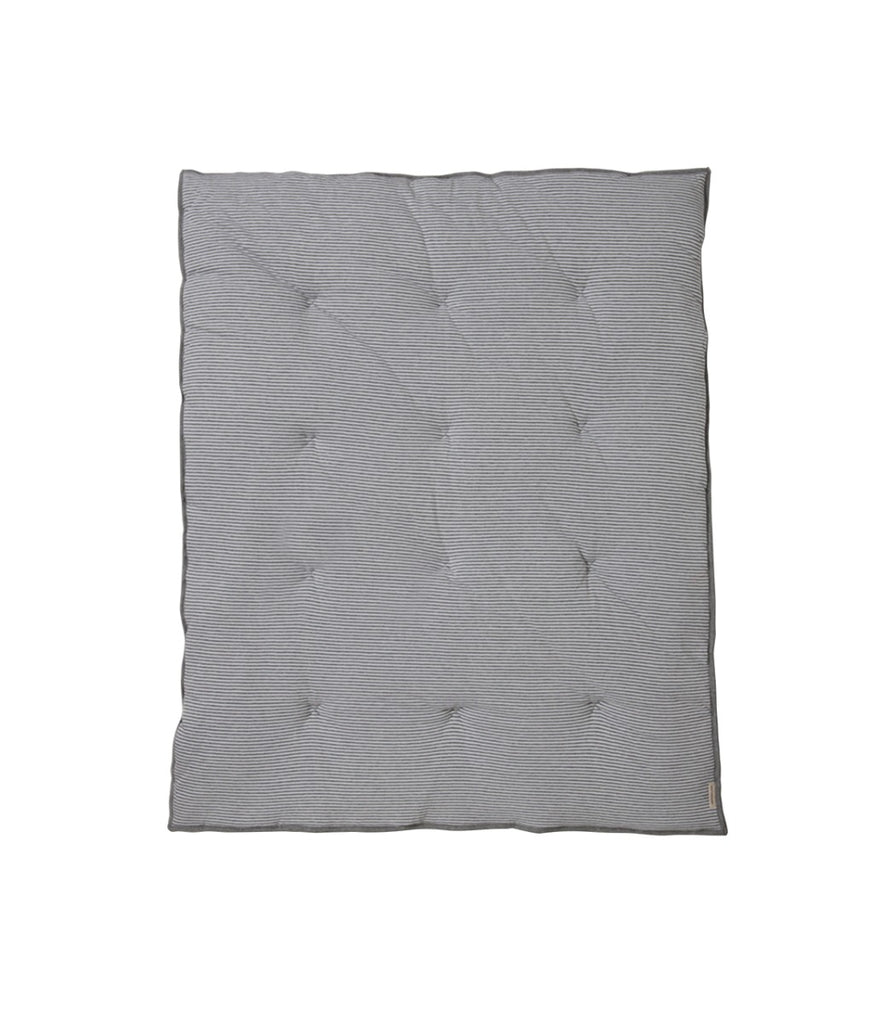 gray mixed pattern baby quilt on a white background