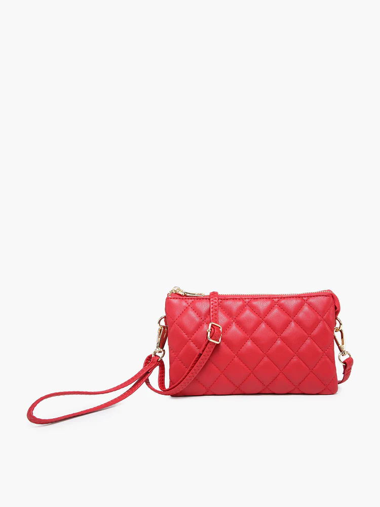 riley quilted crossbody purse on a white background