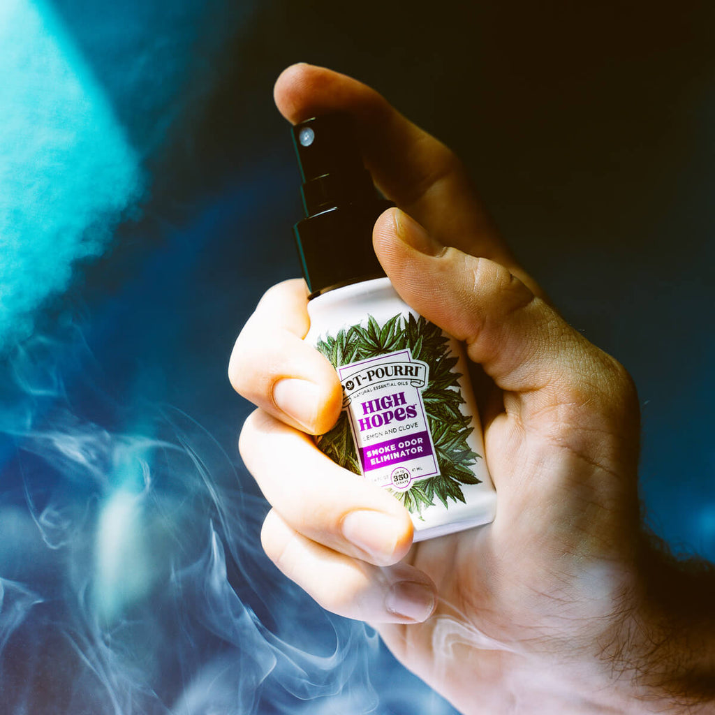 potpourri being sprayed in a smoky room