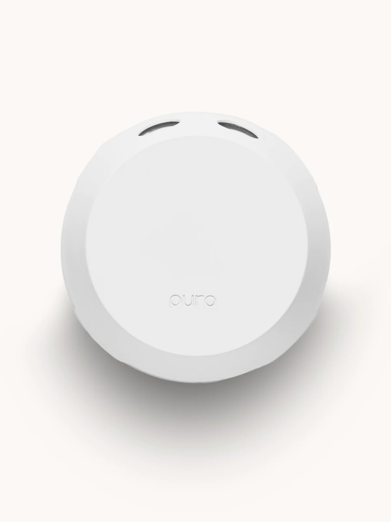 pura smart fragrance diffuser on a white background