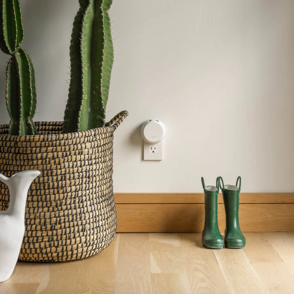 pura smart fragrance diffuser on a white background