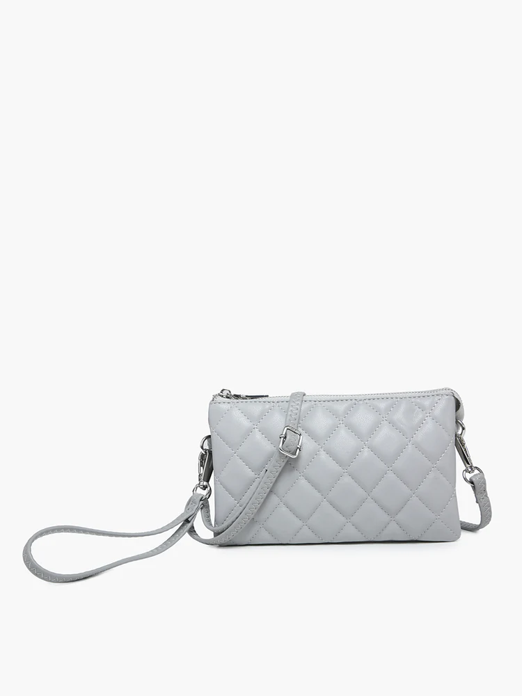 riley quilted crossbody purse on a white background