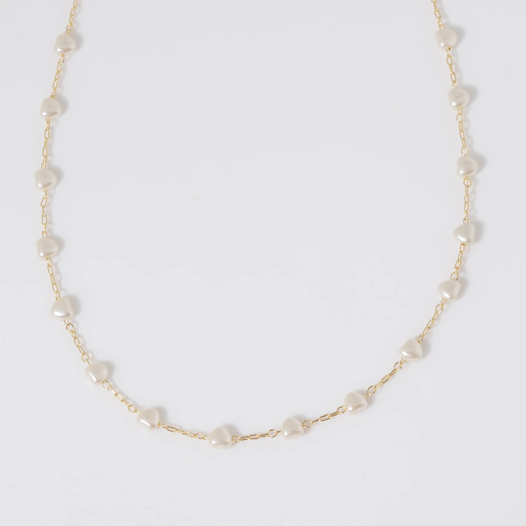 coastal grit necklace on a white background