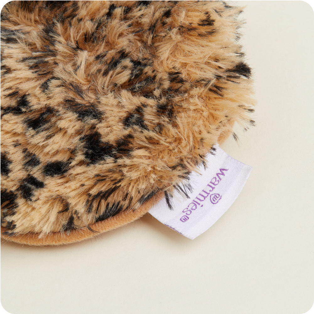 warmies leopard eyemask on a cream background