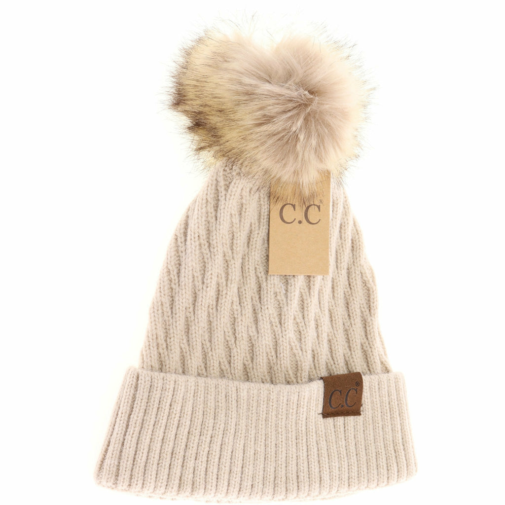 solid honey comb fur pom cc beanie on a white background