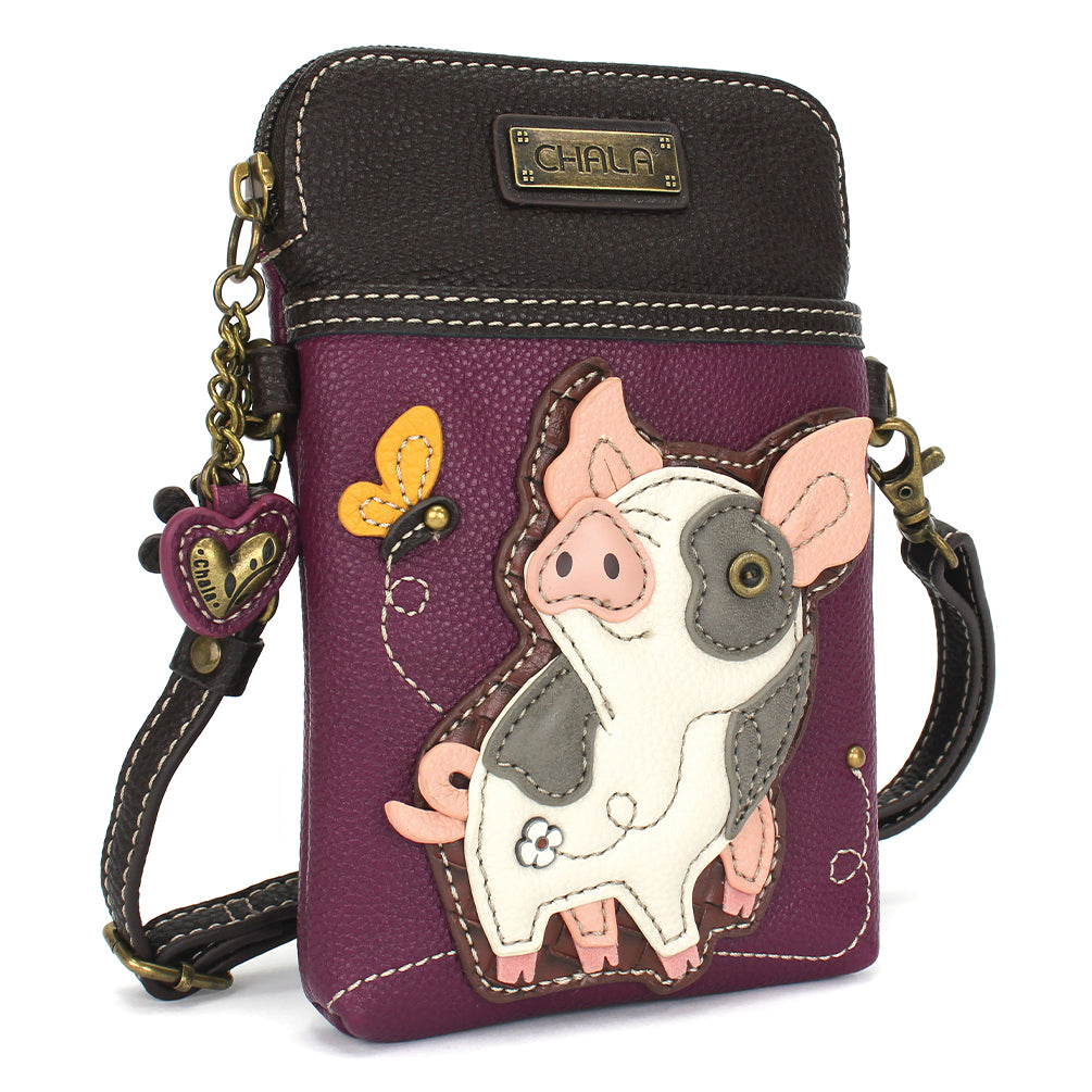 chala spotted pink pig cell phone crossbody on a white background