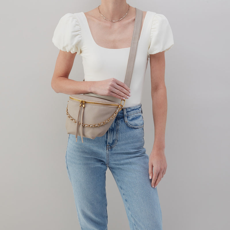 miri belt bag in taupe on a white background