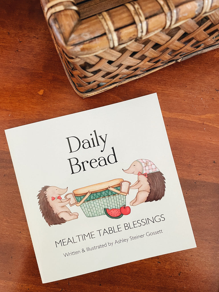 daily bread book on a brown table