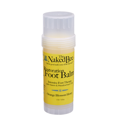 the naked bee foot balm on a white background