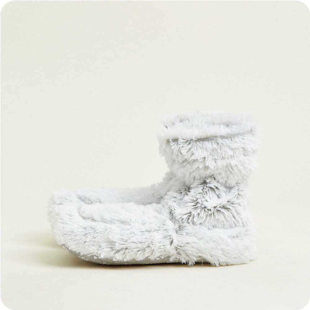 warmies gray marshmallow warmies boots on a cream background