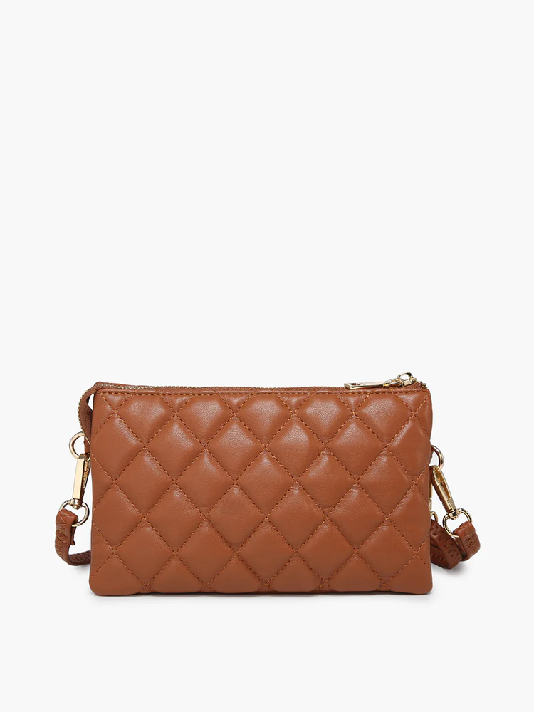 riley quilted crossbody purse on a white background